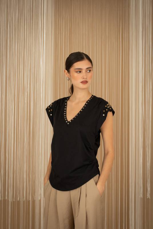 CAMISETA SIN MANGAS TACHAS